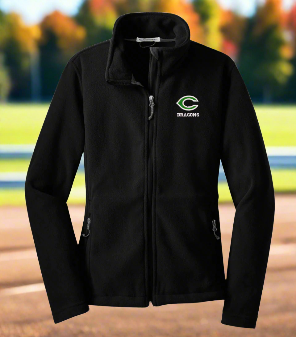 A black fleece jacket with a logo on the left chest area, featuring a collar, zippered pockets, and open cuffs.