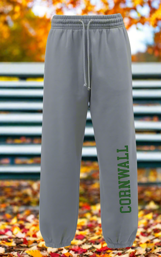 Gray sweatpants with 'Cornwall' printed in green on a white background