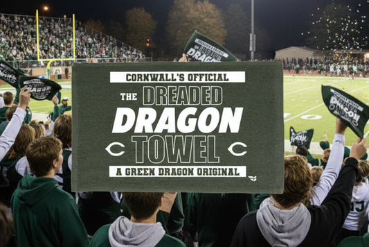 Green towel with white text and branding, featuring 'The Dreaded Dragon Towel' on a dark green background.
